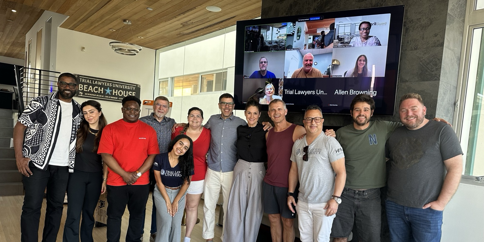The September 2026 Claude Bootcamp class standing together, with Matthew Westerbeck and Shemia Fagan in the middle and remote attendees on the screen behind